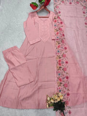 Pink traditional outfit with floral border on a light gray background
