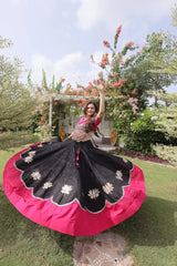 Designer Black Lehenga Choli with Colorful Handcrafted Embroidery, Hot Pink Border, and Festive Wear Appeal