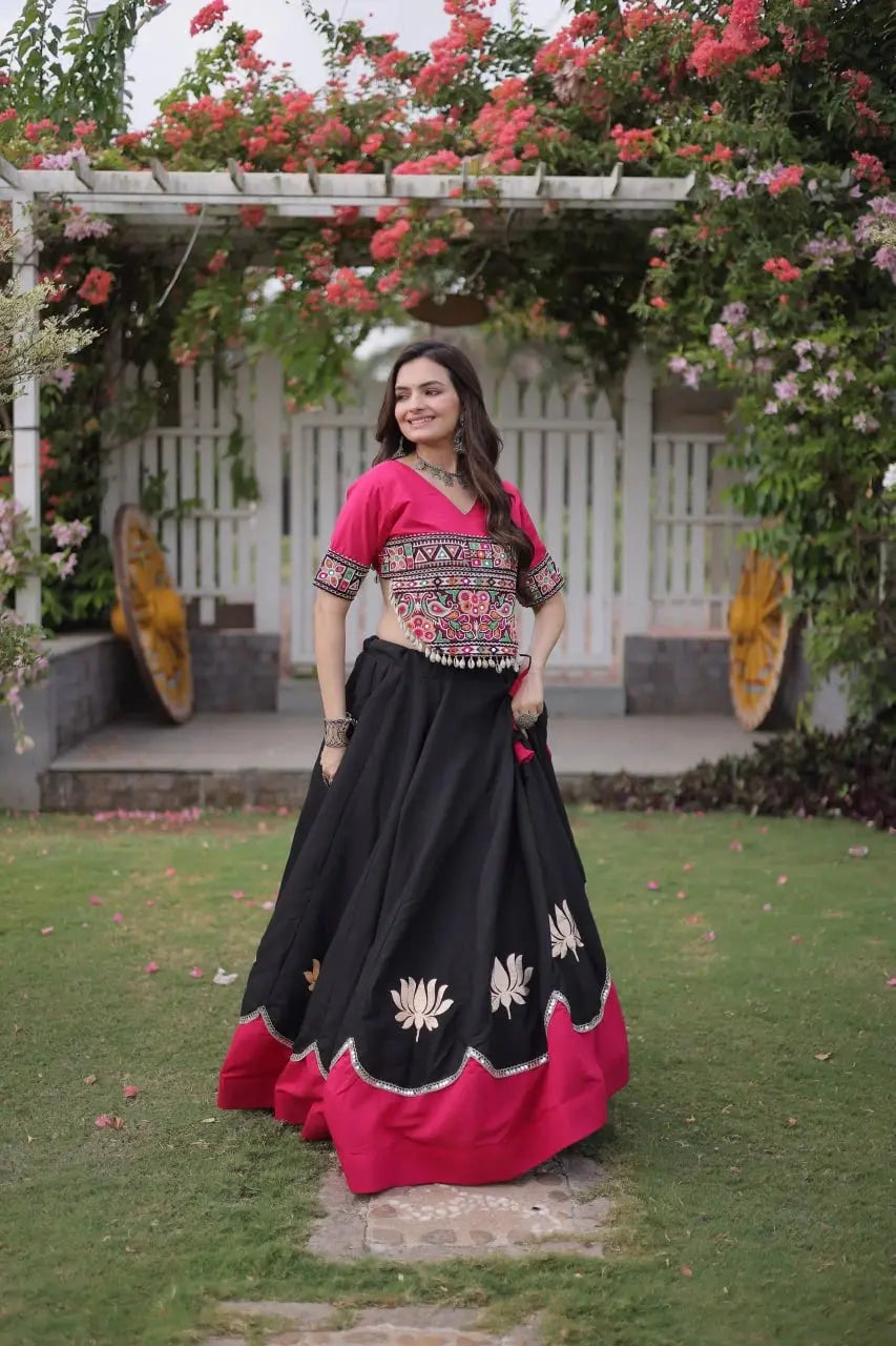 Stunning Black and Hot Pink Lehenga Choli with Vibrant Kutchi Embroidery, Flowing Flared Skirt, and Festive Traditional Appeal