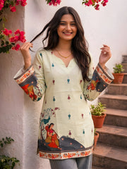 Close-up of Pista Green Kalamkari Short Kurti showing V-neckline and scattered butti motifs on soft cotton fabric