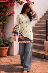 Pista Green Kalamkari Short Kurti front view with traditional musician motifs and printed hem border, paired with grey jeans
