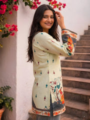 Side view of Pista Green Kalamkari Short Kurti showing side slit and printed hem border in cotton fabric