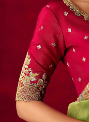 Red saree with gold embroidery on a red background