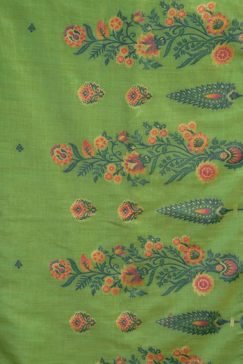 Green fabric with floral and leaf patterns
