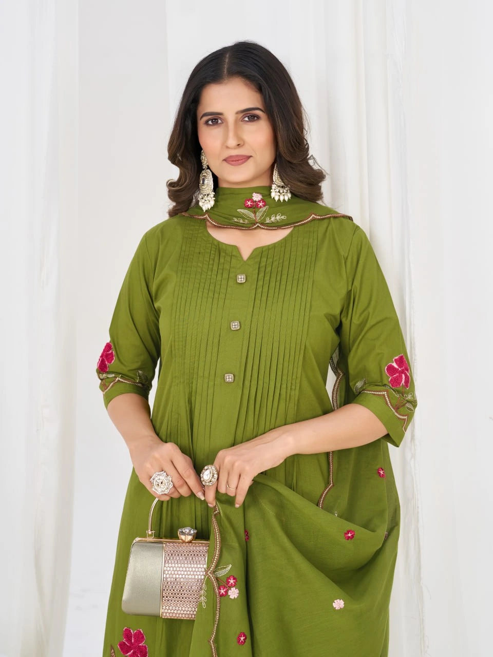 Women's olive green kurta and pant set with intricate floral detailing and a lightweight embroidered dupatta for timeless charm.