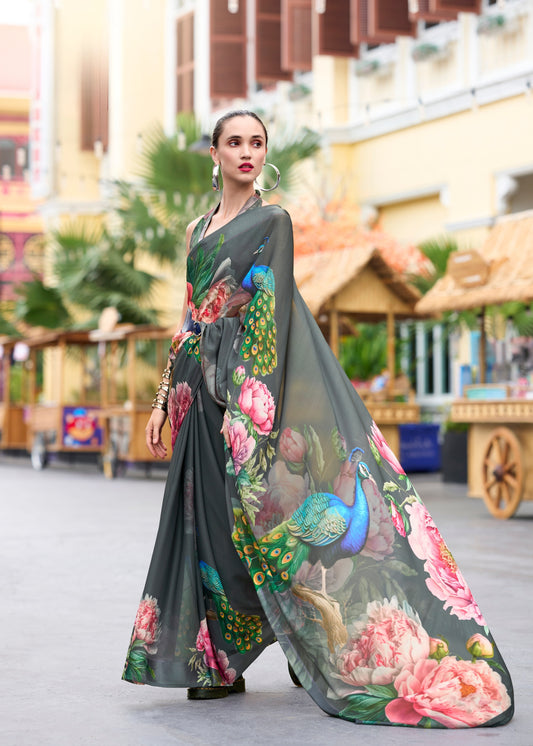 Woman wearing a floral saree with a colorful design in an outdoor setting