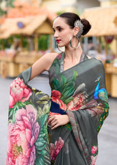 Woman wearing a floral and peacock design saree with a blurred background