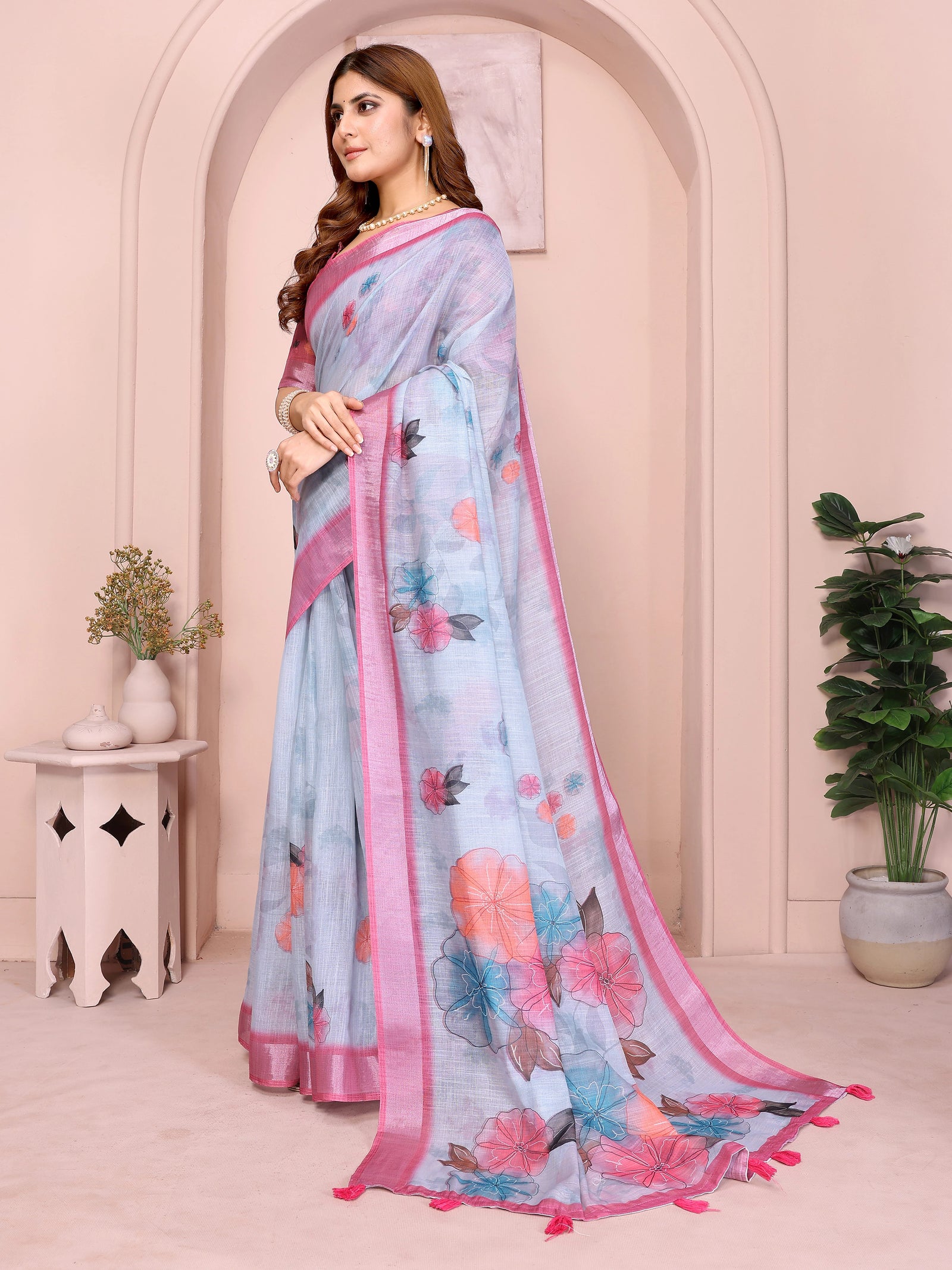 Powder Blue Digital Floral Print Saree side drape – printed floral pallu with pink shimmer contrast border and pink tassels