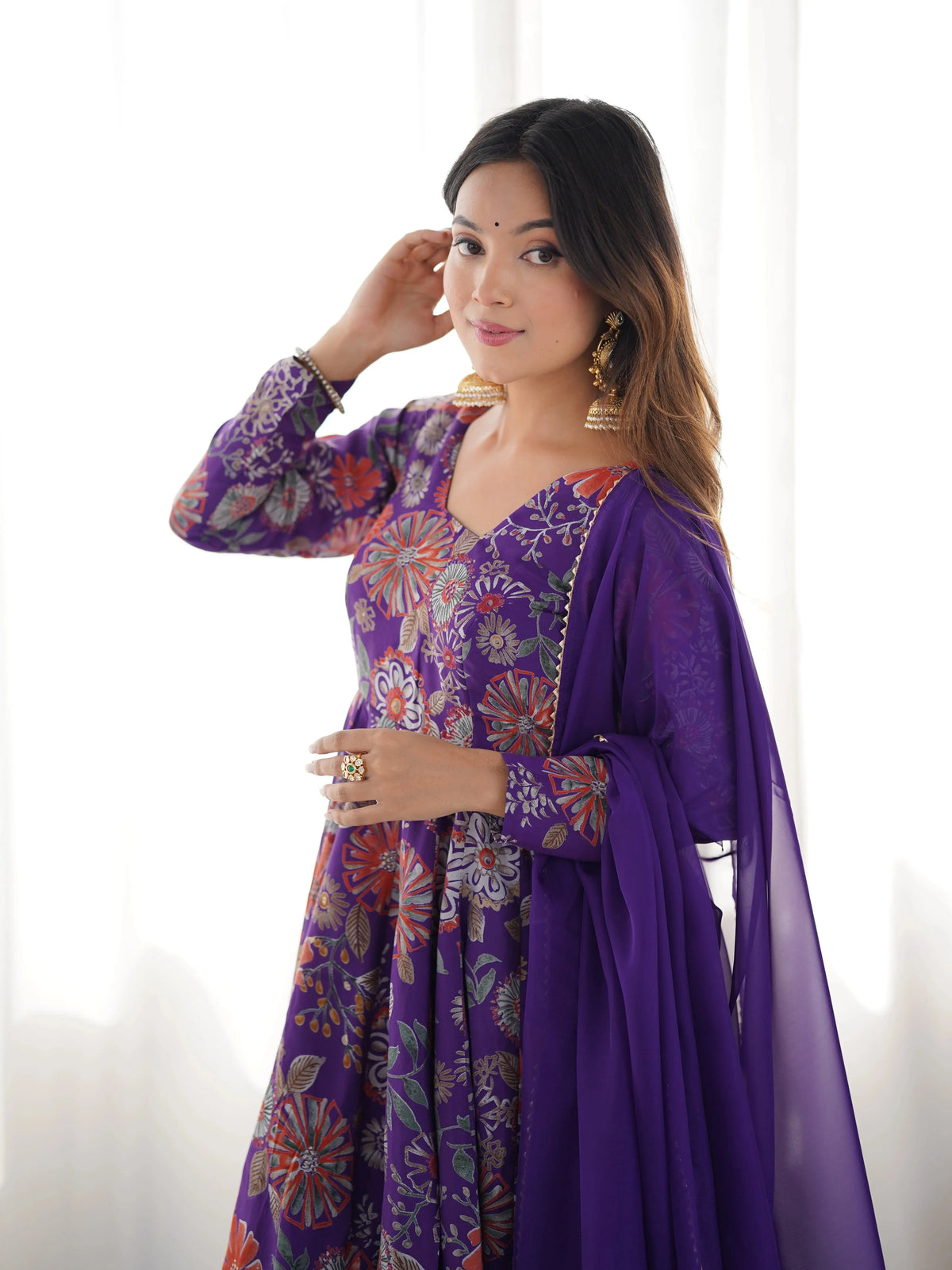 Close-up of Purple Discharge Print Suit neckline and floral print