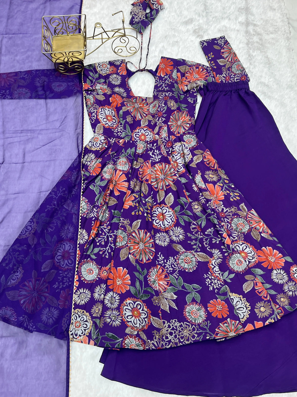 Purple Discharge Print Suit flat lay showing kurta, palazzo and dupatta set