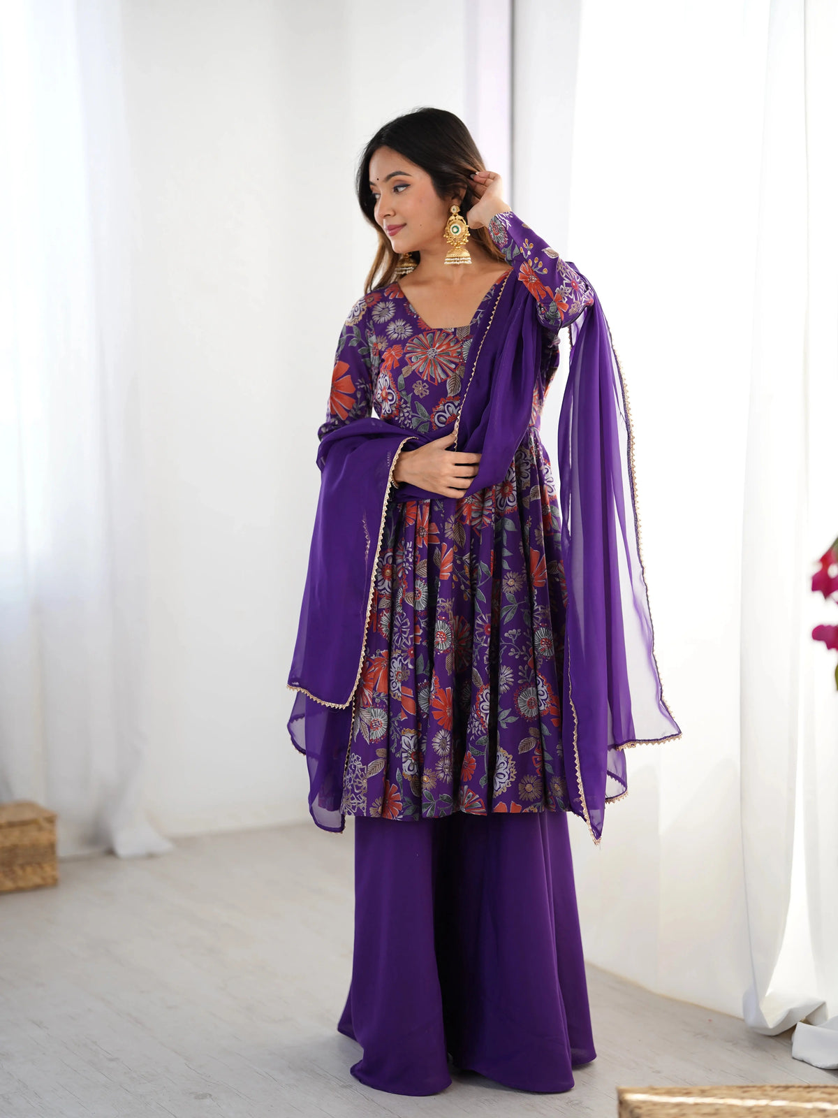 Purple Discharge Print Suit, dupatta draped over shoulder