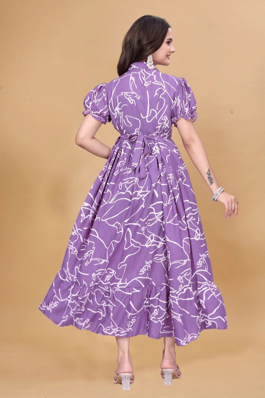 Woman wearing a purple dress with white floral pattern on a beige background
