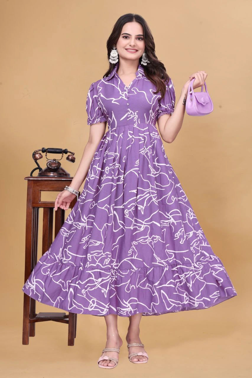 Woman wearing a purple dress with white patterns on a beige background