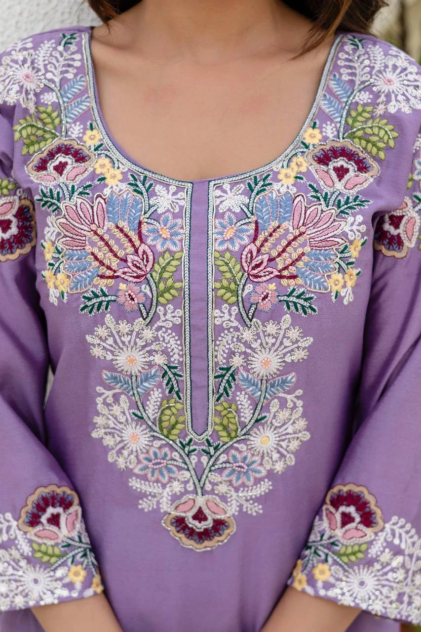 Purple embroidered garment with floral patterns
