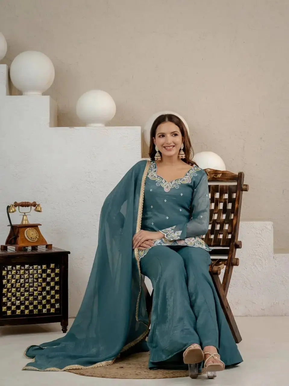 Rama Blue Sequins Embroidered Suit model sitting with dupatta