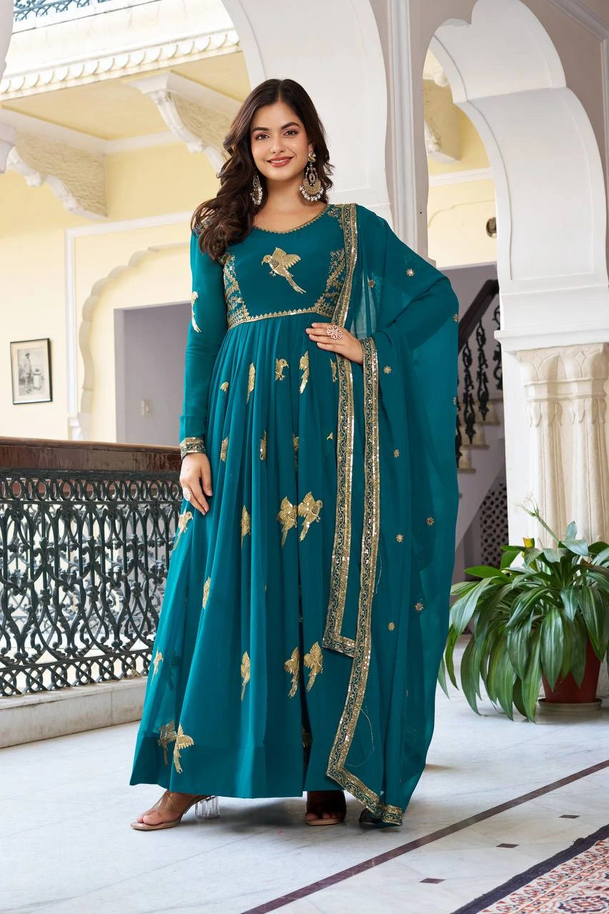 Elegant Rama blue suit featuring intricate sequins and thread embroidery