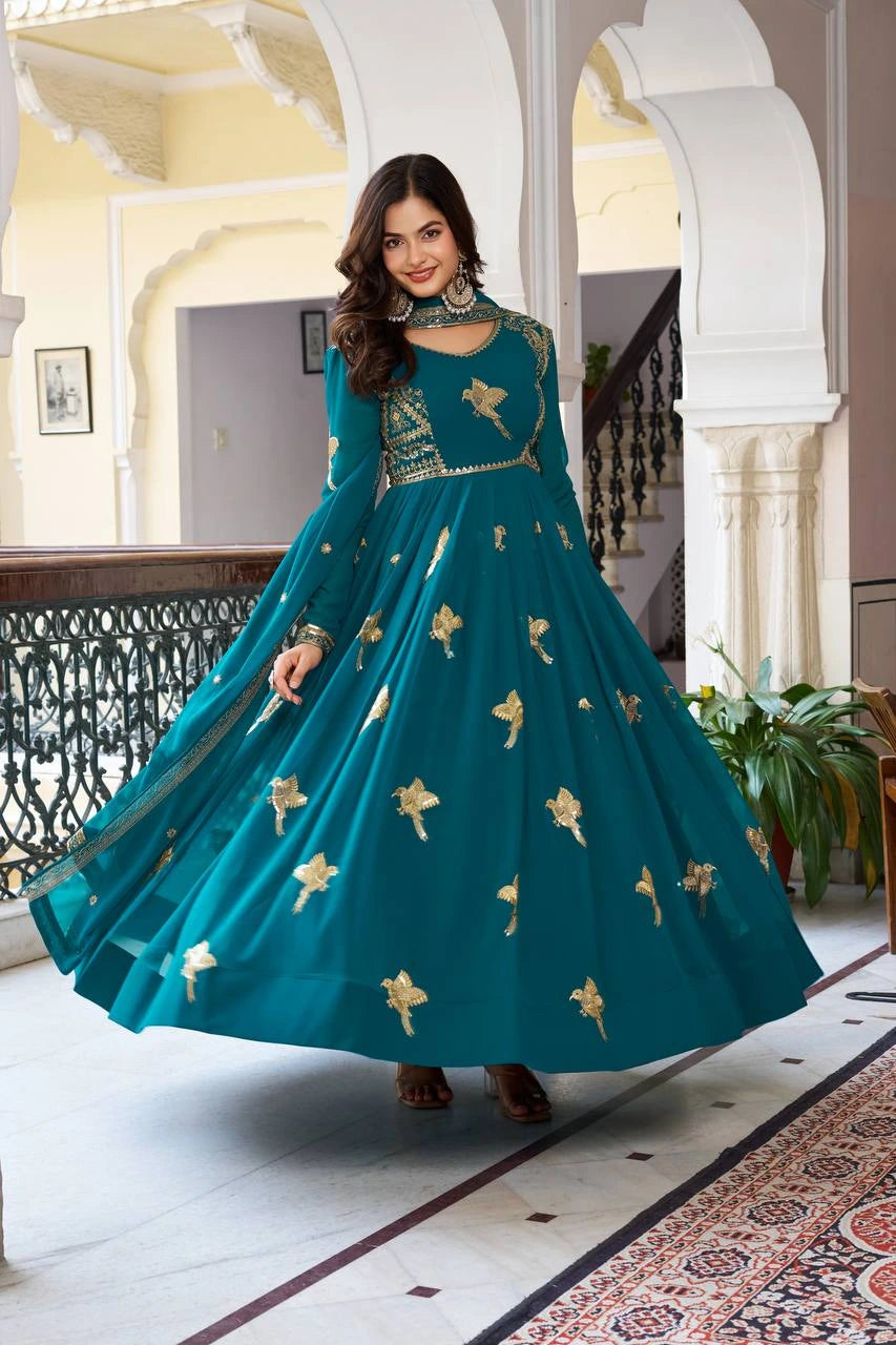 Detailed product listing of Rama blue faux georgette suit with sequins from Kalyanja Fashion