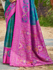 Colorful saree with intricate patterns on a natural background