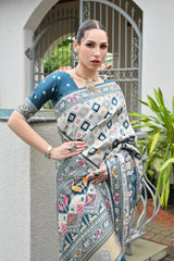 Elegant soft Banarasi silk saree in rich blue shade featuring intricate zari border and pallu.