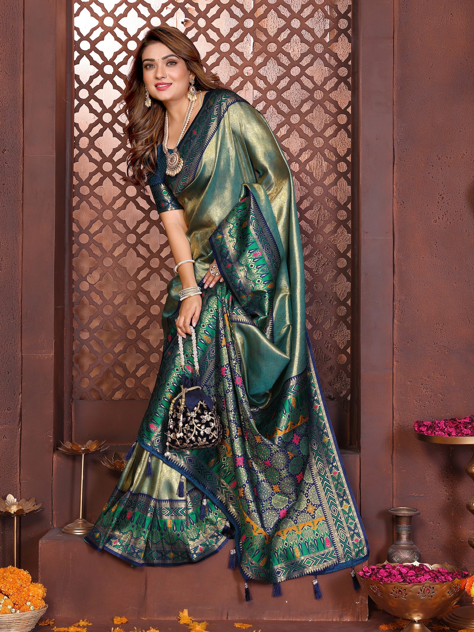 “Luxurious soft pure Banarasi tissue silk saree in Rama blue shade featuring traditional zari patterns.
