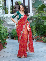Full length front view of Red Gota Patti Saree with green Mono Silk blouse