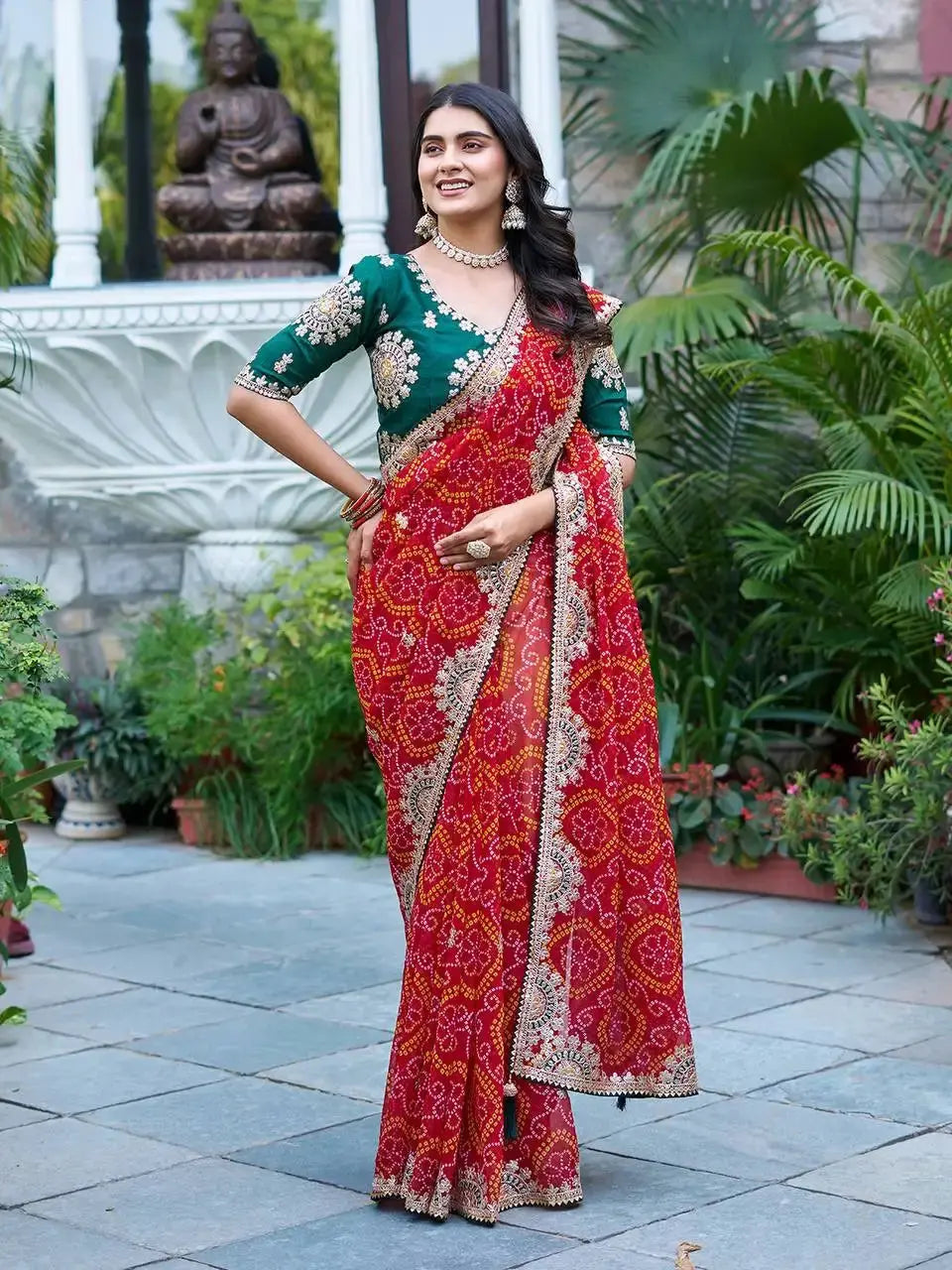 Model in Red Gota Patti Saree with bandhani print, side pose