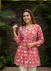 Red cotton short kurti with vibrant digital floral print, round neckline, and 3/4th sleeves — stylish casual wear for everyday comfort