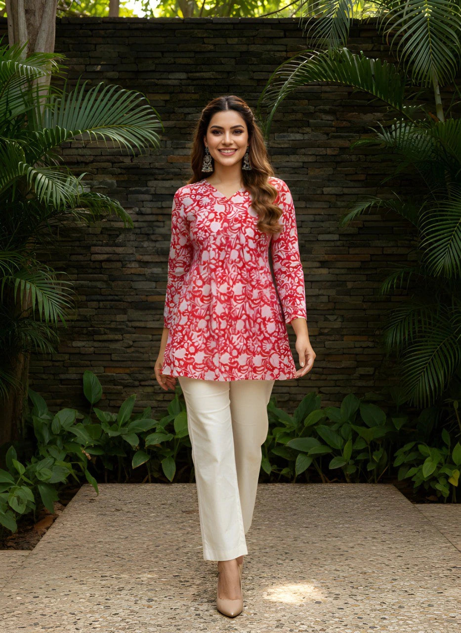 Red cotton short kurti with vibrant digital floral print, round neckline, and 3/4th sleeves — stylish casual wear for everyday comfort