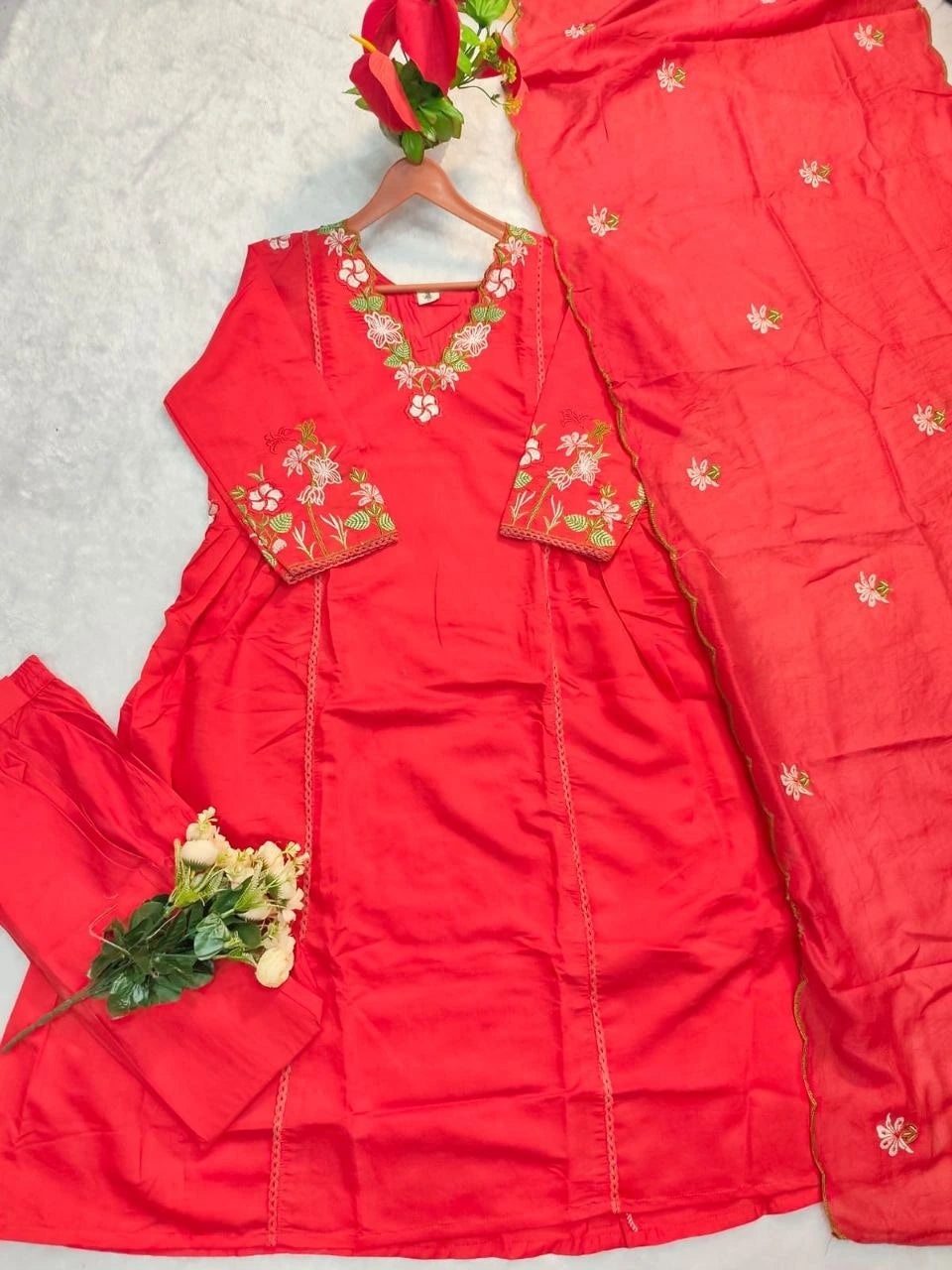 Red embroidered outfit with matching pants on a white background
