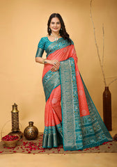 Woman wearing a pink and blue saree with decorative elements on a beige background