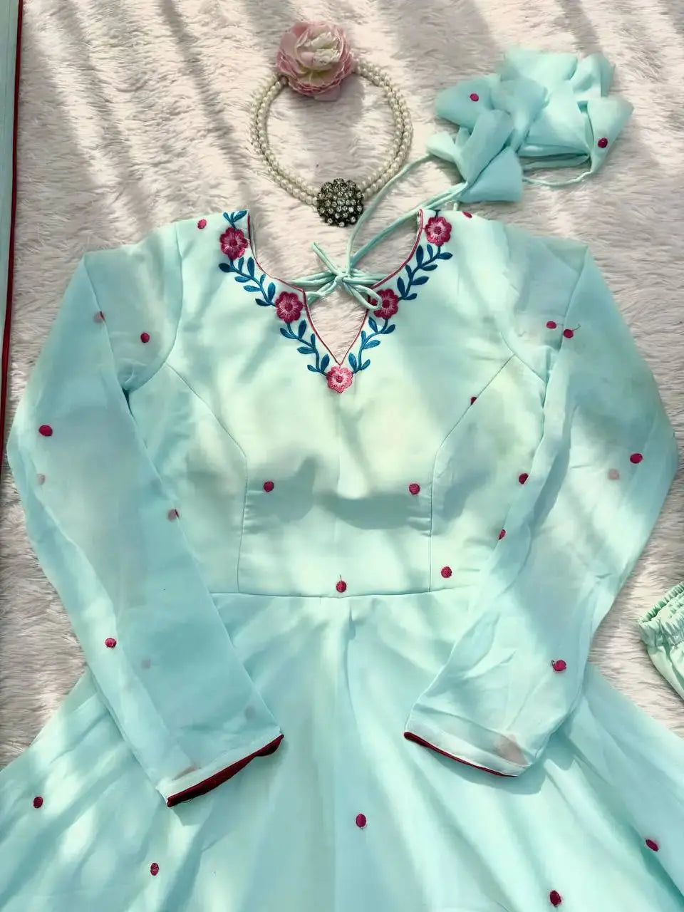 Close-Up of Floral Thread Embroidery V-Neckline on Sky Blue Anarkali Suit