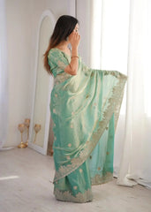 Sky Blue Zari Embroidered Saree side pose with pallu draped over shoulder