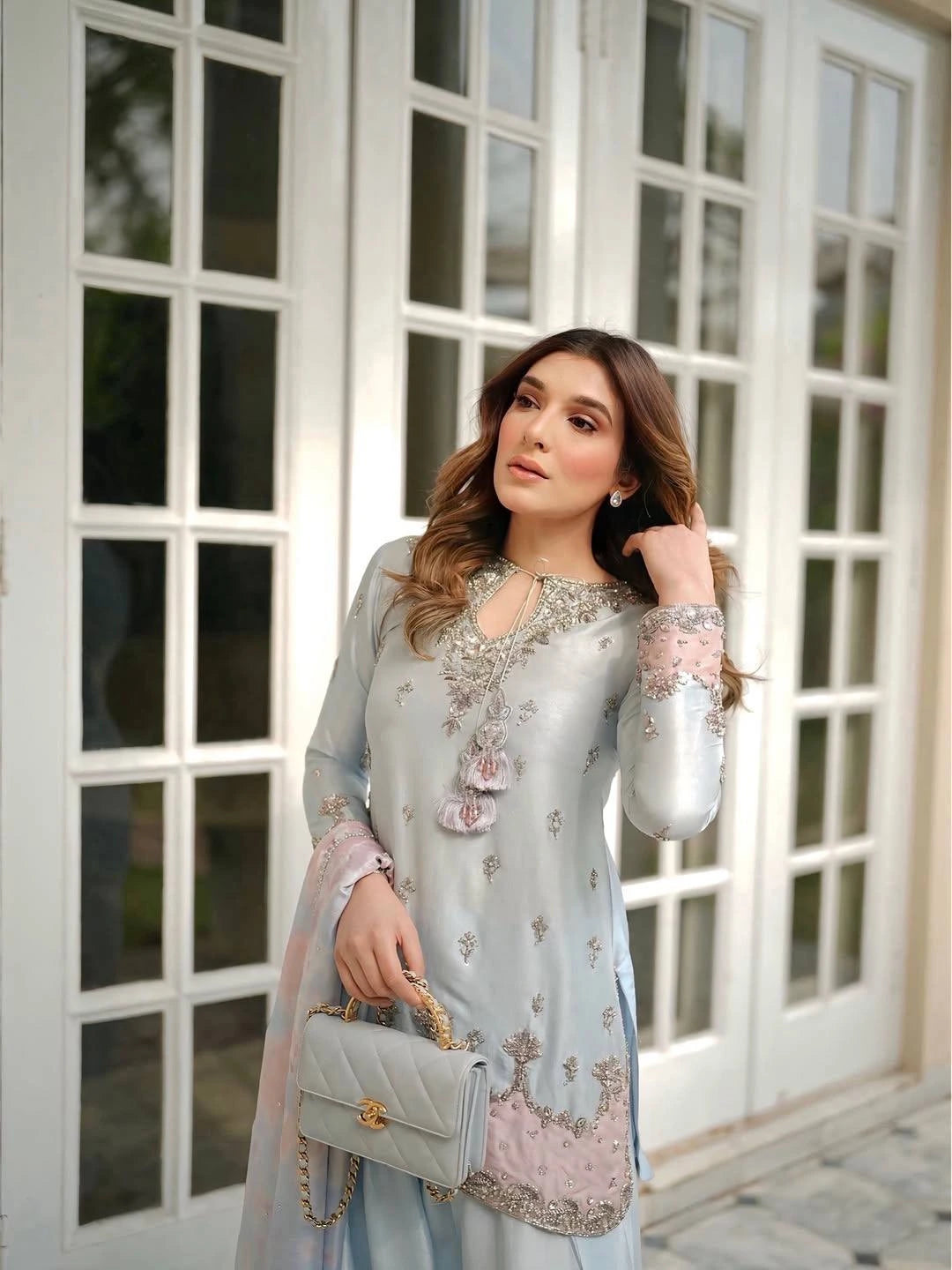 Detailed product listing of sky blue sequins embroidered satin silk suit from Kalyanja Fashion