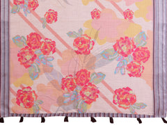 Flat lay of Soft Peach Digital Floral Print Linen Cotton Saree showing full fabric with rose clusters and contrast border with tassels
