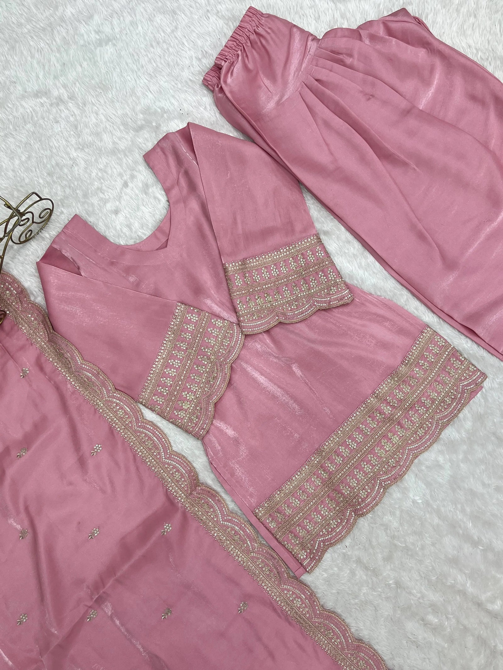 Scalloped Zari and Sequins Hem Border Close Up on Soft Pink Roman Silk Suit