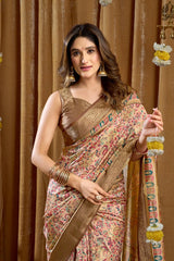 Woman wearing a traditional saree with a decorative background