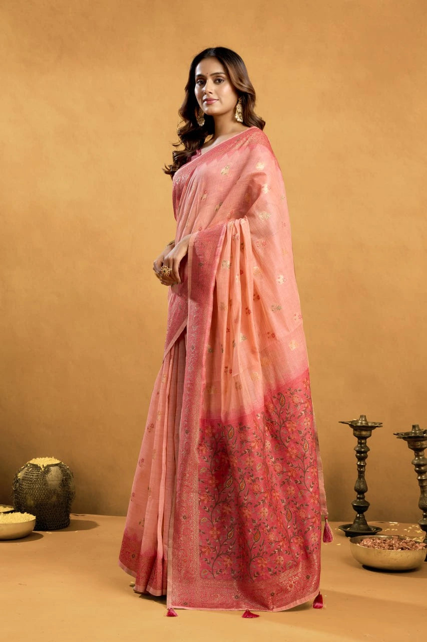 Woman wearing a pink saree with a gradient effect against a beige background