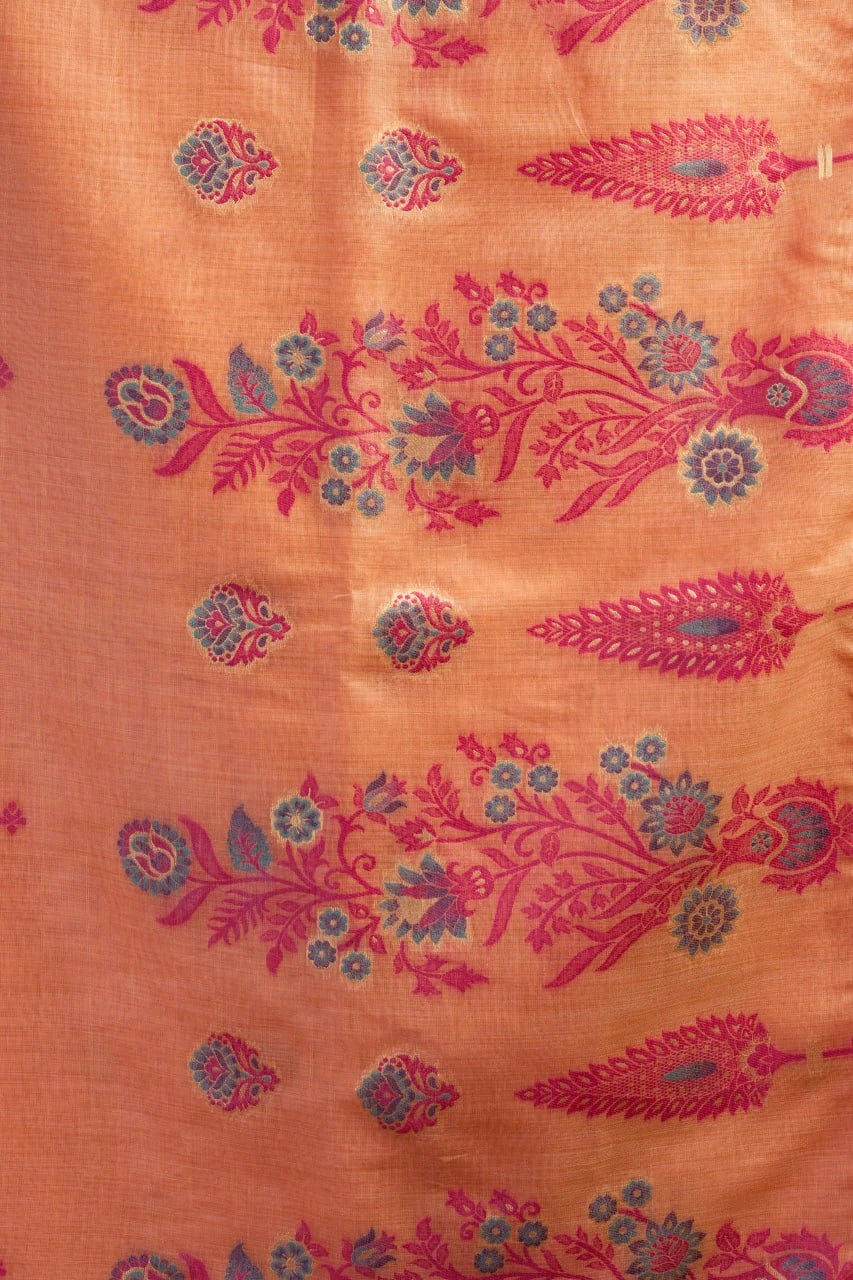 Orange fabric with pink and blue floral patterns