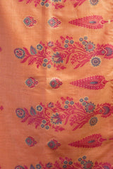 Orange fabric with pink and blue floral patterns