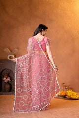 Premium ethnic saree crafted with sparkling embellishments, elegant patterns, and contemporary traditional styling.