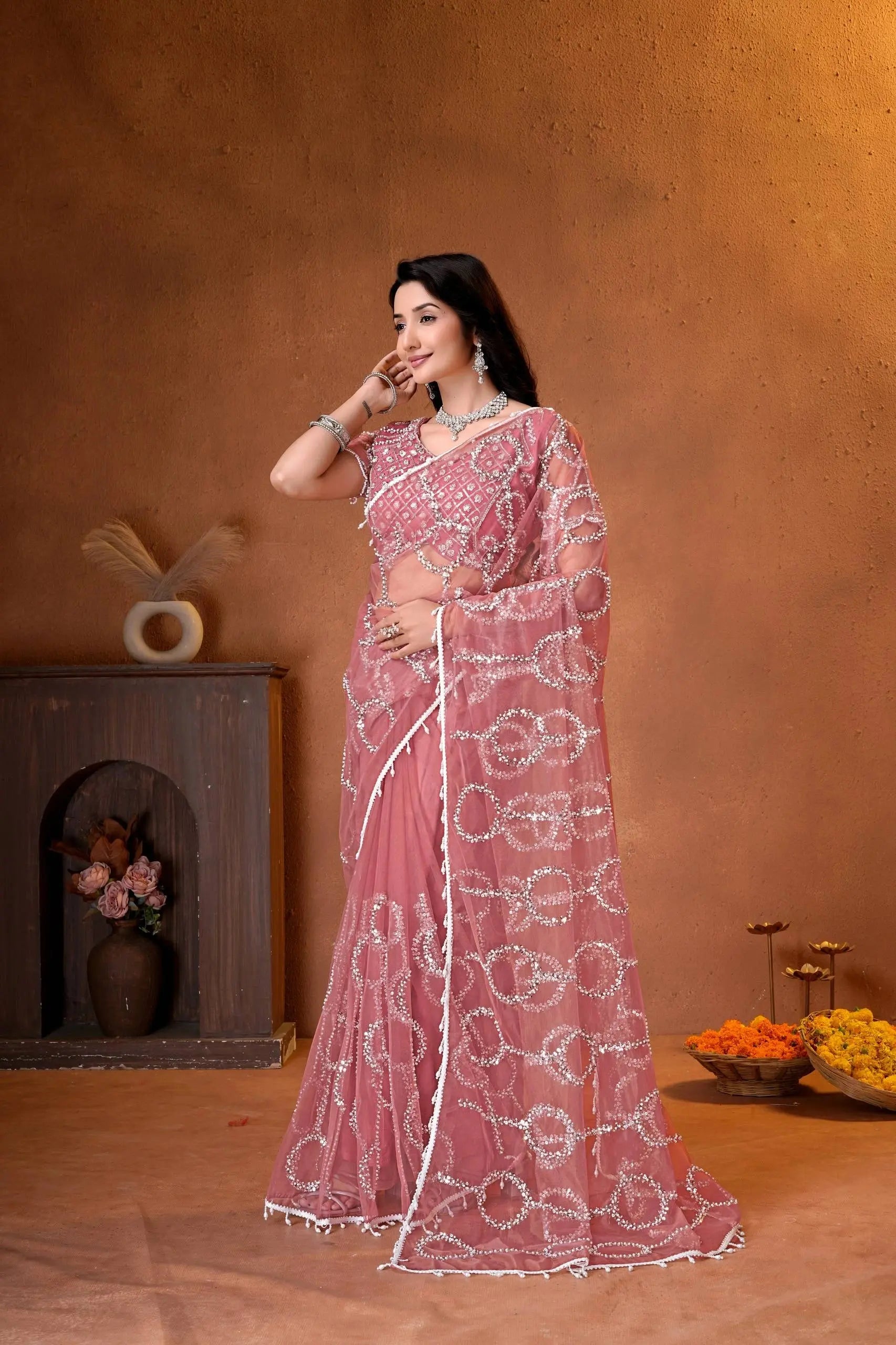 Beautiful Indian saree with all-over sequins embroidery, stylish short sleeves, and sophisticated festive appeal.