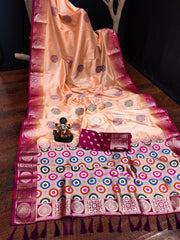 Traditional saree with intricate patterns on a wooden surface