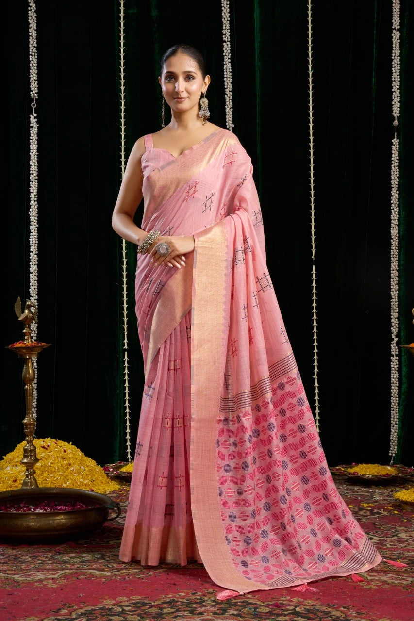 Woman in a pink saree with a black background