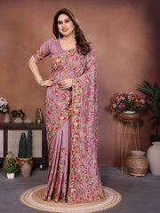 Woman wearing a floral saree in a decorated indoor setting
