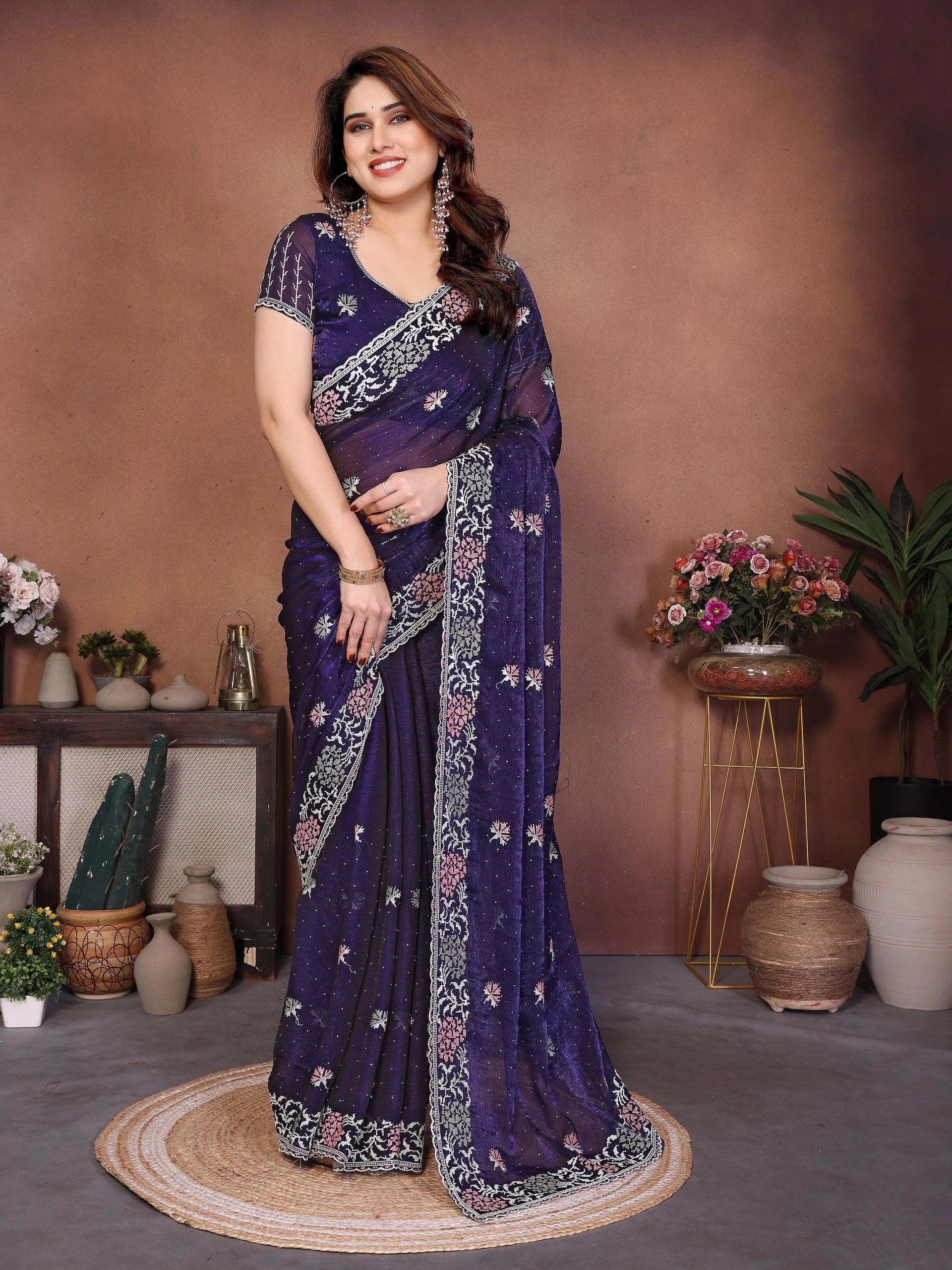 Soft purple embroidered Swarovski work chiffon silk saree with delicate Fendy design, shimmering border, and matching blouse piece — elegant attire for festive and wedding occasions