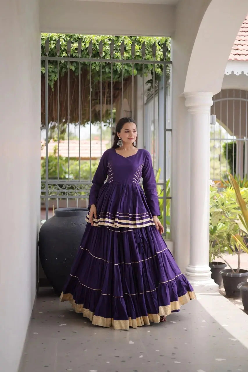 Traditional Indian Purple Lehenga Choli featuring Elegant Flared Skirt, Full Sleeves, and Rich Gota Lace Work