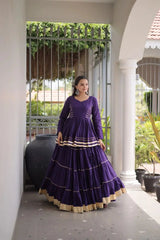 Traditional Indian Purple Lehenga Choli featuring Elegant Flared Skirt, Full Sleeves, and Rich Gota Lace Work