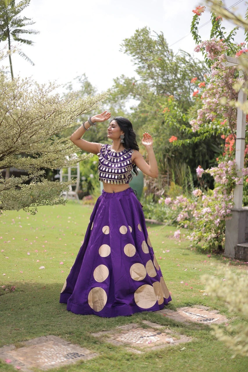 Premium purple party wear lehenga designed with luxurious detailing and elegant traditional craftsmanship.