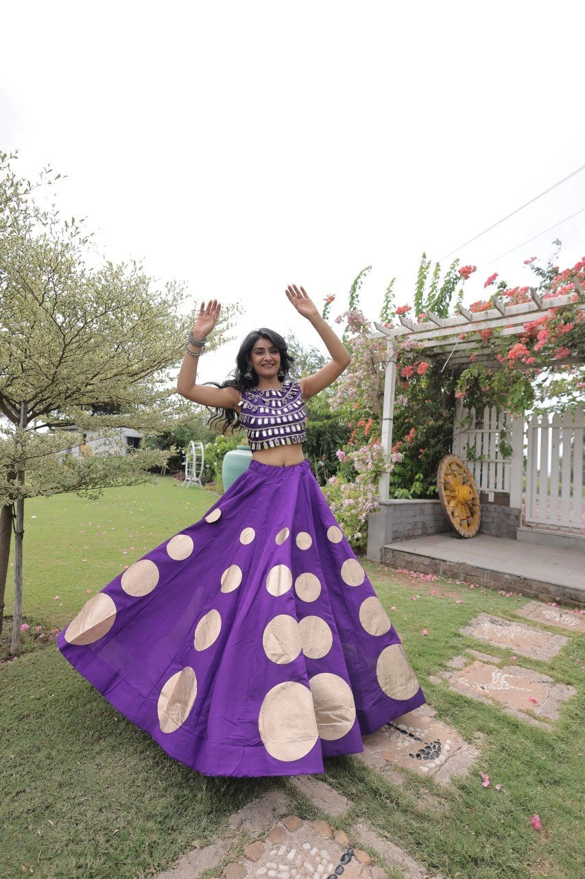 Designer festive lehenga crafted with shimmering mirror embellishments and premium fabric for a rich ethnic look.