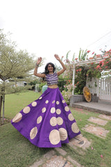Designer festive lehenga crafted with shimmering mirror embellishments and premium fabric for a rich ethnic look.
